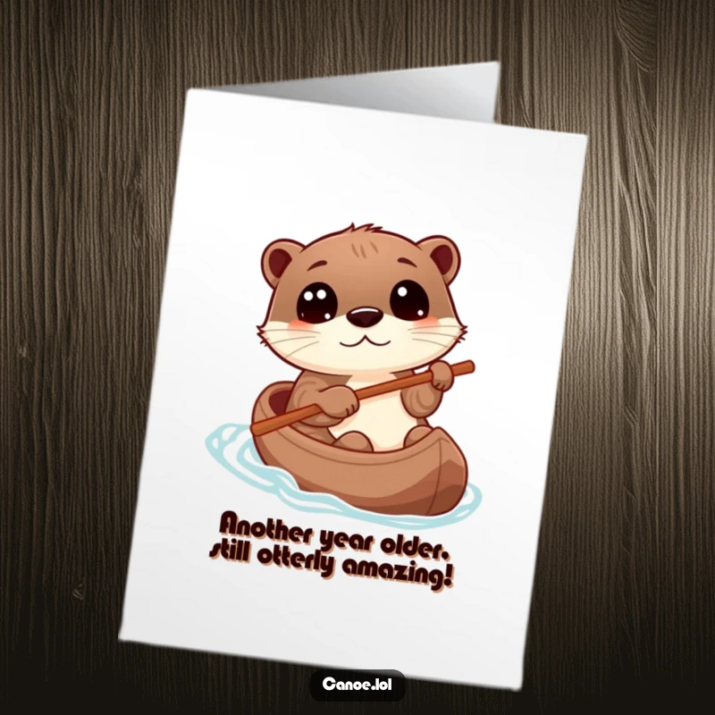 Funny Free Printable Birthday Card: Playful otter eyes wide steering canoe with stick, celebrating a birthday.