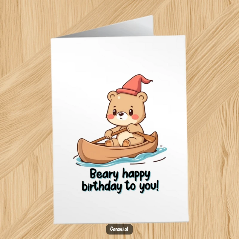 Funny Free Printable Birthday Card: Cute bear cub steering a canoe with intense focus and determination.